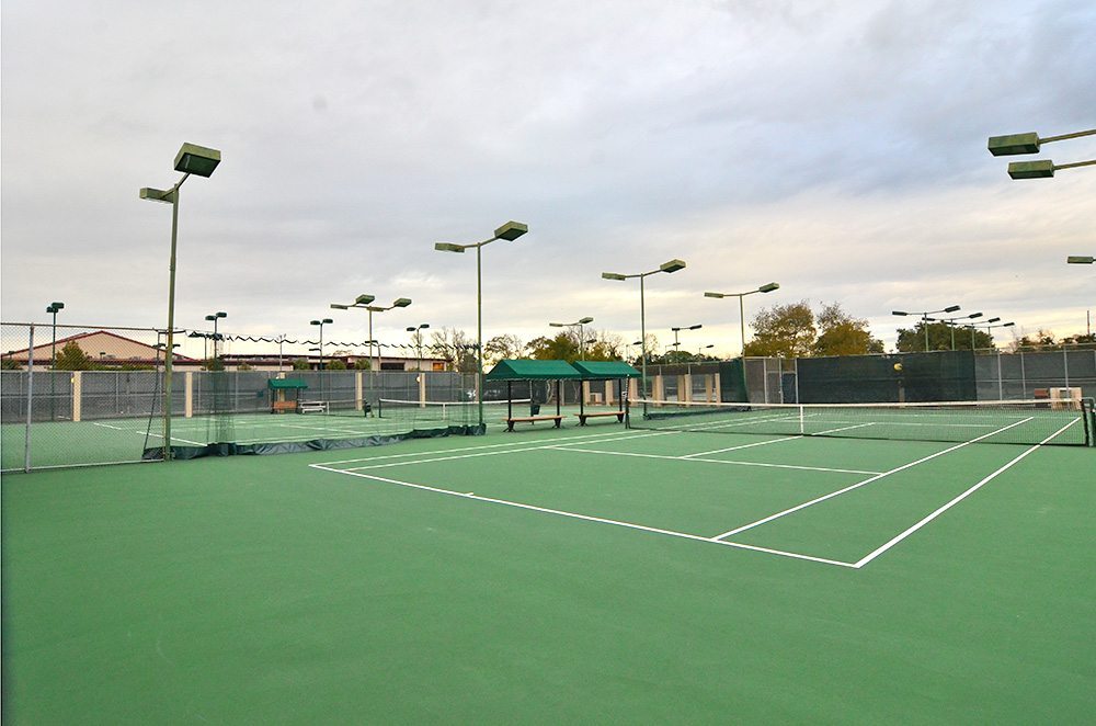 Outdoor hard surface tennis courts at Red's in Lafayette, LA.
